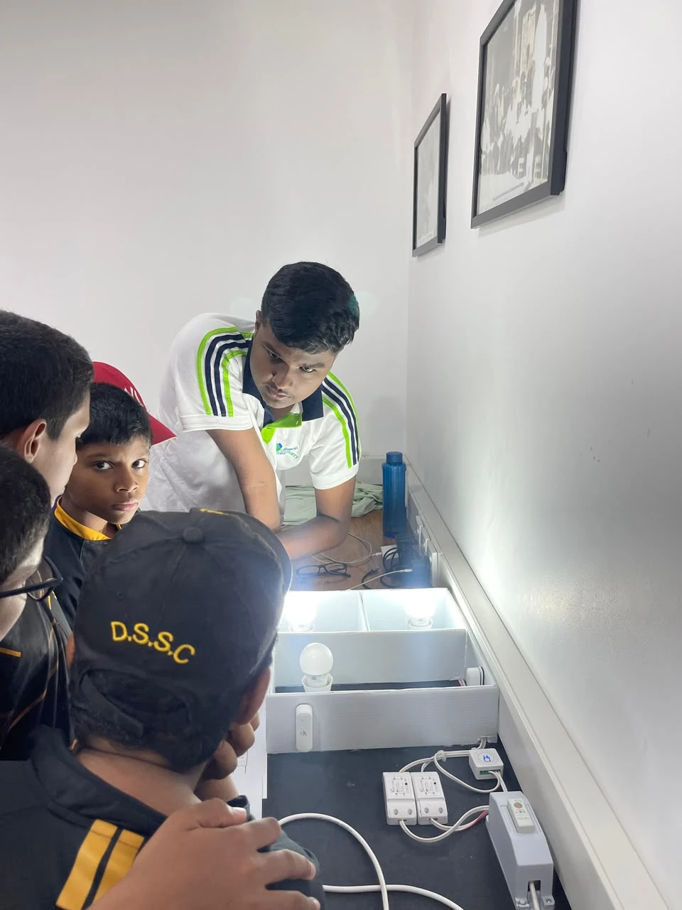 NEST members and students together inside the school classroom